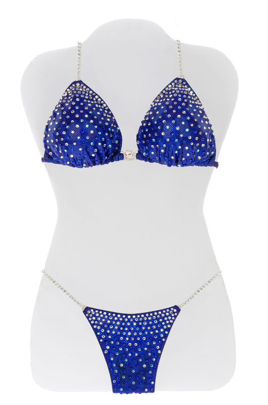 JW Couture Custom Bikini and Bikini Wellness Competition Suit. Rhinestones fading down from the top on the front, in a mix of crystal clear and colour, on blue fabric. Handmade in Canada.