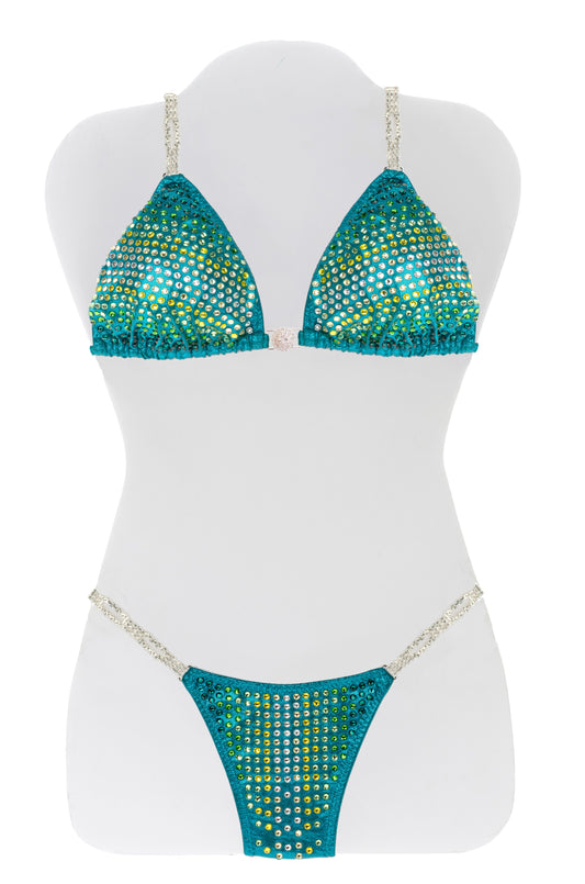 JW Couture Custom Bikini and Bikini Wellness Competition Suit. Heavily rhinestoned front, crystal clear fading outwards from the center area, on turquoise fabric. Handmade in Canada.