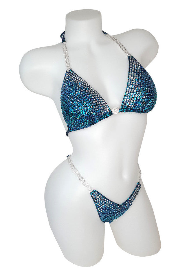 JW Couture Custom Bikini and Bikini Wellness Competition Suit. Fully rhinestoned with crystals fading from inside edge of top, turquoise fabric. Handmade in Canada.