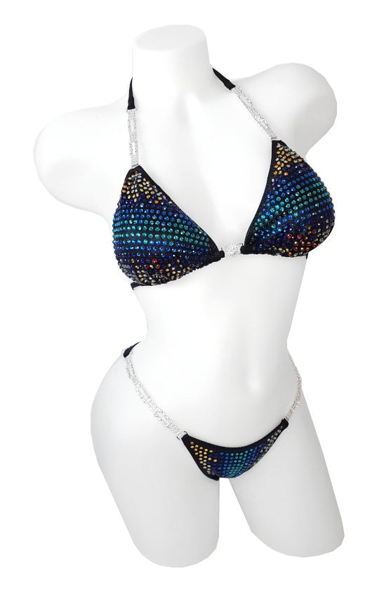 JW Couture Custom Bikini and Bikini Wellness Competition Suit. Heavily rhinestoned front, multi-coloured stones fading outwards from the center area, on black fabric. Handmade in Canada.
