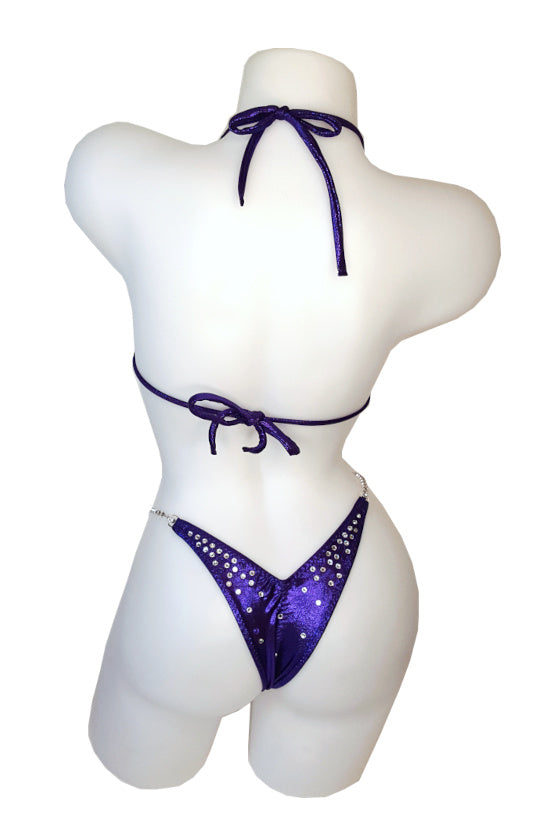 JW Couture Custom Bikini and Bikini Wellness Competition Suit. Rhinestones collected in the corners on the back, in crystal clear, on purple fabric. Handmade in Canada.