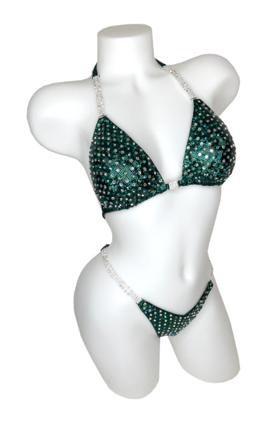 JW Couture Custom Bikini and Bikini Wellness Competition Suit. Evenly rhinestoned front, in a mix of crystal clear and colour, on dark green fabric. Handmade in Canada.