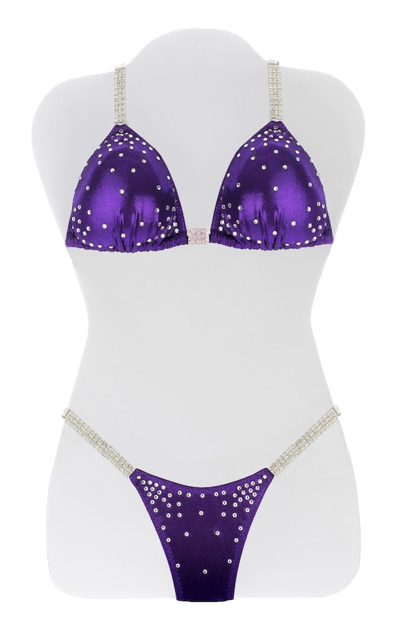 JW Couture Custom Bikini and Bikini Wellness Competition Suit. Rhinestones collected in the corners on the front, in crystal clear, on purple fabric. Handmade in Canada.