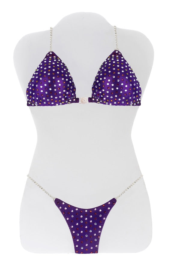 JW Couture Custom Bikini and Bikini Wellness Competition Suit. Evenly rhinestoned front, in a mix of crystal clear and colour, on purple fabric. Handmade in Canada.